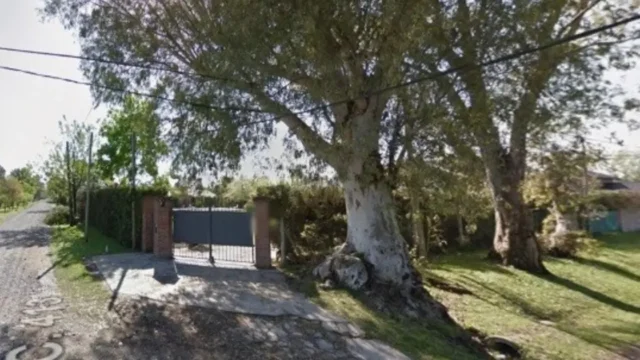 Investigan la muerte de una mujer hallada en un pozo en Villa Elisa. Fotografía editorial relacionada con muerte en Villa Elisa. publicada en Netaware