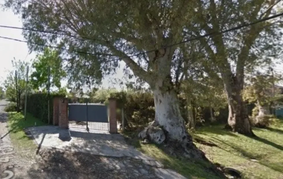 Investigan la muerte de una mujer hallada en un pozo en Villa Elisa. Fotografía editorial relacionada con muerte en Villa Elisa. publicada en Netaware